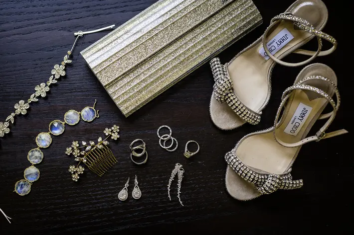 Flat lay with Jimmy Choo shoes purse and jewelry JAGStudios