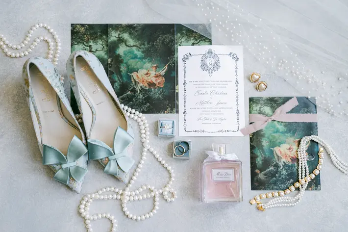 Flat lay wedding detail of invitations by Kate Noelle Photography