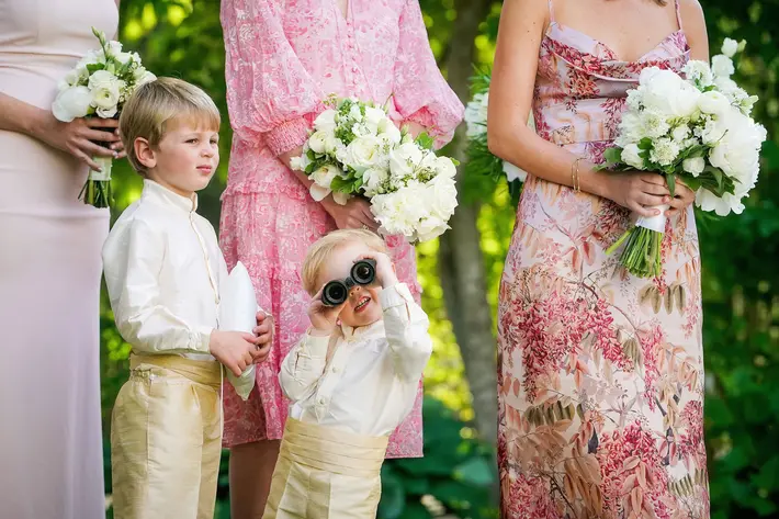 Kids at weddings, photo of little boy with binoculars taken by Boston wedding photographer Kate McElwee