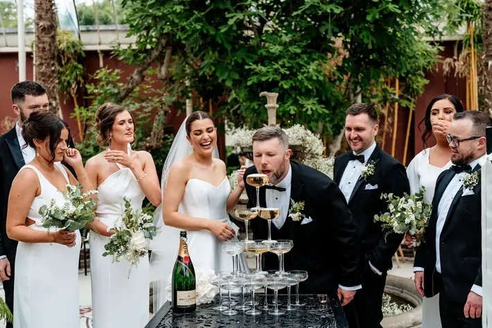 Champagne pop at Kilshane House wedding photographed by Sarah Kate Murphy