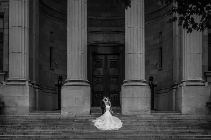Bride and groom portrait on historic quebec stairs-Madi Photography
